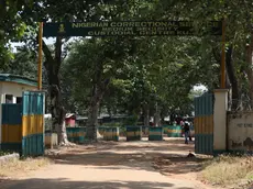 epa10055816 Gate of the Kuje Medium prison in Abuja, Nigeria, 06 July 2022. Boko Haram gunmen are suspected of attacking the Kuje Medium Prison. Some 400 inmates are missing. EPA/STRINGER