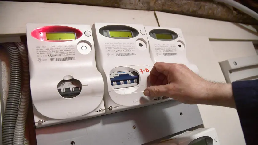 Contatori di energia elettrica in un palazzo, Genova 14 marzo 2018 ANSA/LUCA ZENNARO