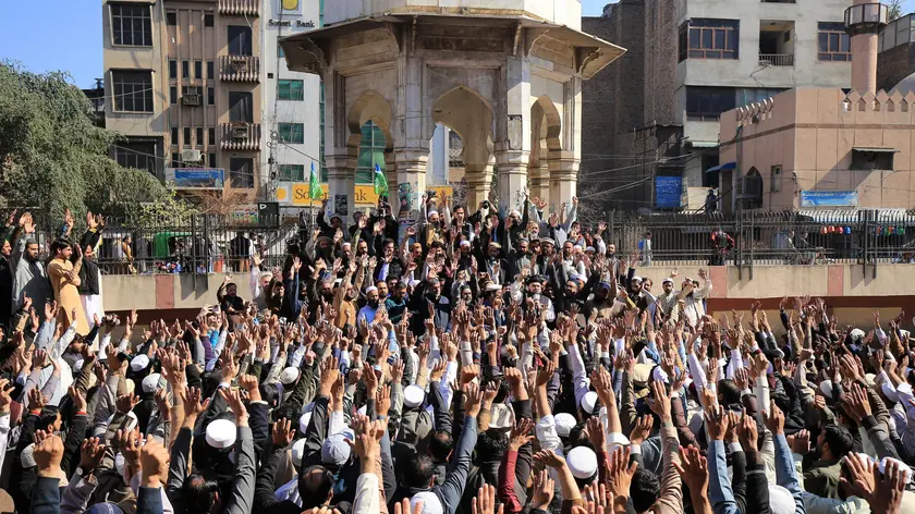 epaselect epa11174615 Supporters of Muttahida Shariat Mahaz Pakistan conservative party gather to protest against a recent judgement passed by the Chief Justice of Pakistan, Qazi Faez Isa, in Peshawar, Pakistan, 23 February 2024. Supporters of Pakistani Islamist parties rallied against the Chief Justice's remarks, alleging blasphemy. The protest, led by groups including Tehreek-e-Labaik Pakistan, denounced Chief Justice Qazi Faez Isa's comments in a case involving an Ahmadi community member. The court's decision to grant bail to the accused, who faced blasphemy charges for distributing Islamic literature, sparked outrage. Police warned protesters to remain peaceful as demonstrations erupted in cities like Karachi and Peshawar. The Supreme Court refuted allegations, calling the campaign against Chief Justice Isa 'absolutely wrong,' amid claims linking the controversy to political motives, including grievances against former Prime Minister Imran Khan. EPA/BILAWAL ARBAB