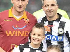 Italian forward and captain of AS Roma, Francesco Totti (L), poses for a photo with Italian forward and captain of Udinese, Antonio Di Natale, prior the Italian Serie A soccer match Udinese Calcio vs AS Roma at Friuli stadium in Udine, Italy, 09 March 2013..ANSA/LUCIANO ROSSI/AS ROMA