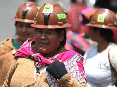 epa10961196 Miners march against restrictions on gold exploitation in protected areas in Bolivia, in La Paz, Bolivia, 06 November 2023. Thousands of cooperative miners from Bolivia marched this 06 November in La Paz to demand that the Government of Luis Arce cancel a rule that prohibits the exploitation of gold in protected areas along with a series of other requests for their sector. EPA/LUIS GANDARILLAS