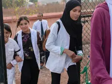 epa10867698 Children attend classes in a tent school prepared by the Moroccan army for students affected by an earthquake in the village of Asni, south of Marrakesh, Morocco, 18 September 2023. Moroccan soldiers stationing in the village of Asni, set up the tent school for children to be able to continue their education. The school building in Asni was completely destroyed by the earthquake on 08 September. A magnitude 6.8 earthquake that struck central Morocco late 08 September has killed nearly 3,000 people and damaged buildings from villages and towns in the Atlas Mountains to Marrakesh, according to a report released by the country's Interior Ministry. EPA/JALAL MORCHIDI