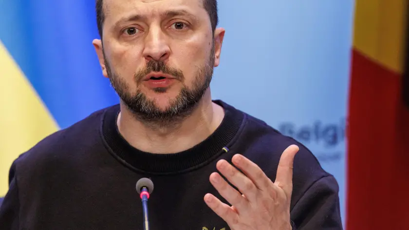 epa11374883 Ukraine's President Volodymyr Zelensky gestures as he addresses the media alongside Belgium's Prime Minister during a surprise visit at the Prime Minister's office in Brussels, Belgium, 28 May 2024. Zelensky visits Belgium to ink the latest in a string of security accords with Western allies. The two leaders will discuss, among other things, Belgium's military support to Ukraine and the signing of a bilateral security agreement, including the supply of F-16 fighter jets as part of the security agreement. EPA/OLIVIER MATTHYS
