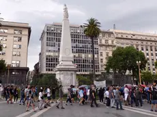 epa10316992 Dozens of people gather in the Plaza de Mayo to pay homage to the recently deceased activist Hebe de Bonafini, in Buenos Aires, Argentina, 20 November 2022. Groups defending human rights together with relatives of disappeared persons gathered to circle around the Pyramid of May (Piramide de Mayo) as an act of respect and homage to de Bonafini, President of the Argentine association Madres de Plaza de Mayo. Bonafini (1928-2022), 93, died at the Italian Hospital in La Plata, capital of the province of Buenos Aires, where she had been hospitalized for several days due to the worsening of her chronic illnesses. EPA/Enrique Garcia Medina