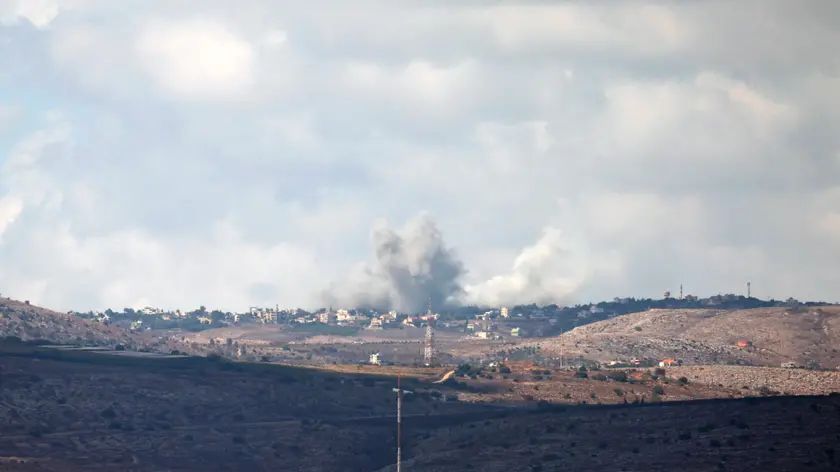epa11620324 Smoke rises after an Israeli airstrike that targeted a Lebanese village, as seen from the Upper Galilee, northern Israel, 23 September 2024. The Israeli military said that The IDF is currently conducting strikes on targets belonging to the Hezbollah organization in southern Lebanon and urged civilians in areas where Hezbollah operates in Lebanon to leave, saying that they are conducting 'extensive airstrikes.' EPA/ATEF SAFADI