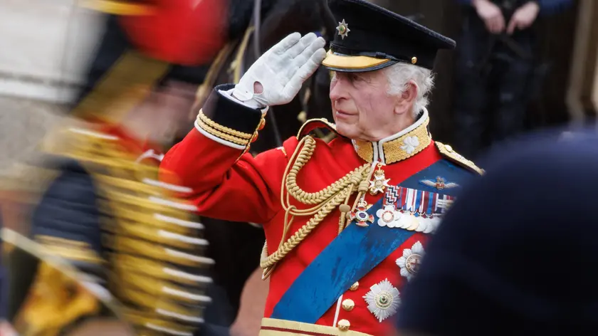 epa11412204 Britain's King Charles III salutes the troops parading at the annual Trooping the Colour parade in London, Britain, 15 June 2024. The King's birthday parade, traditionally known as Trooping the Colour, is a ceremonial military parade to celebrate the official birthday of the British sovereign. Britain's Catherine Princess of Wales made her first public appearance since she disclosed that she has been diagnosed with cancer in March 2024. EPA/TOLGA AKMEN