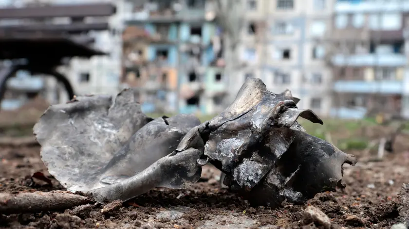 epa11235699 A piece of rocket debris is seen at the scene of a strike near a residential building in Zaporizhzhia, Ukraine, 22 March 2024, amid the Russian invasion. According to the Air Force Command of the Armed Forces of Ukraine, Russia has launched strikes on over 151 targets, 92 of which were destroyed. Several people were killed and at least ten were injured in Zaporizhzhia, as per the State Military Administration statement. EPA/KATERYNA KLOCHKO
