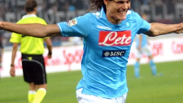 Scc Napoli's Uruguayan forward Edison Cavani jubilates after scoring during Italian serie A match against Ac Milan at San Paolo Stadium in Naples, 18 september 2011. ANSA/CESARE ABBATE