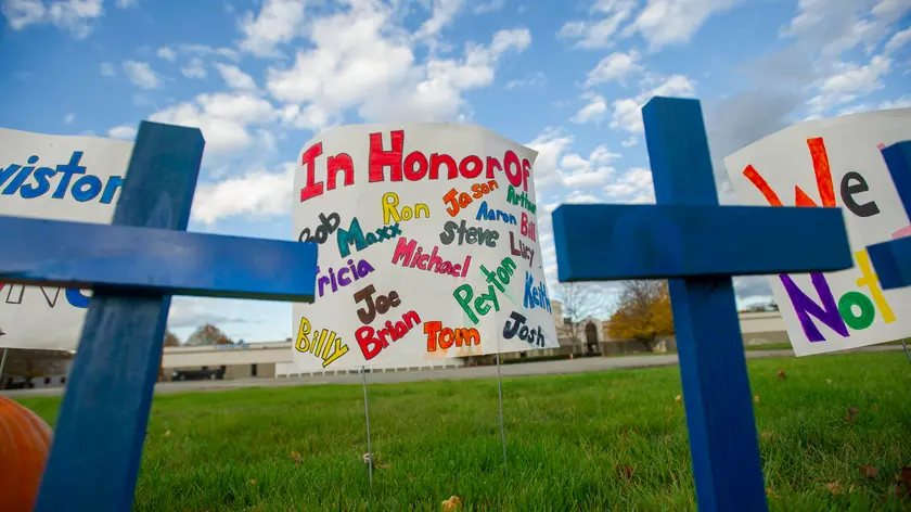 epa10946220 A memorial with crosses and signs honoring the victims is placed in front of Just-In-Time Recreation, also known as Sparetime Recreation, one of the two locations of the mass shooting which killed 18 and injured 13 in Lewiston, Maine, on 25 October 2023, is seen, on 28 October 2023. Robert Card, whose body was found 27 October 2023, is the main suspect following the event. EPA/AMANDA SAGBA