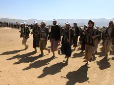 epa11096562 Newly-recruited members of the Houthis' popular army march during a gathering at the end of a military training, on the outskirts of Sana'a, Yemen, 22 January 2024. Yemen's Houthis have mobilized and recruited thousands of tribal militiamen as part of the creation of a popular army dedicated to a possible confrontation with Israel amid fears of a wider regional conflict stemming from the Israel-Hamas conflict. The Houthis have vowed to keep up attacks on ships in the Red Sea and the Gulf of Aden, with the aim of ending the Israeli bombardment of the Gaza Strip, and in response to US-led retaliatory strikes. The US Department of State on 17 January announced the designation of Yemen's Houthis as a 'Specially Designated Global Terrorist group' amid an escalation of their attacks on shipping lanes in the Red Sea, the Bab al-Mandab Strait, and the Gulf of Aden since November 2023. The US Department of Defense announced in December 2023 a multinational operation to safeguard trade and protect ships in the Red Sea amid the escalation in Houthi attacks. EPA/YAHYA ARHAB