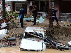 epa08619423 People stand on a flooded-hit street following heavy rainfall in Dereli district of Giresun, Turkey, 23 August 2020. According to media reports at least 4 people have died in the flood disaster that occurred, 11 people are still missing. TURKEY OUT, USA OUT, UK OUT, CANADA OUT, FRANCE OUT, SWEDEN OUT, IRAQ OUT, JORDAN OUT, KUWAIT OUT, LEBANON OUT, OMAN OUT, QATAR OUT, SAUDI ARABIA OUT, SYRIA OUT, UAE OUT, YEMEN OUT, BAHRAIN OUT, EGYPT OUT, LIBYA OUT, ALGERIA OUT, MOROCCO OUT, TUNISIA OUT, AZERBAIJAN OUT, ALBANIA OUT, BOSNIA HERZEGOVINA OUT, BULGARIA OUT, KOSOVO OUT, CROATIA OUT, MACEDONIA OUT, MONTENEGRO OUT, SERBIA OUT, TURKEY OUT, USA OUT, UK OUT, CANADA OUT, FRANCE OUT, SWEDEN OUT, IRAQ OUT, JORDAN OUT, KUWAIT OUT, LEBANON OUT, OMAN OUT, QATAR OUT, SAUDI ARABIA OUT, SYRIA OUT, UAE OUT, YEMEN OUT, BAHRAIN OUT, EGYPT OUT, LIBYA OUT, ALGERIA OUT, MOROCCO OUT, TUNISIA OUT, AZERBAIJAN OUT, ALBANIA OUT, BOSNIA HERZEGOVINA OUT, BULGARIA OUT, KOSOVO OUT, CROATIA OUT, MACEDONIA OUT, MONTENEGRO OUT, SERBIA OUT, SHUTTERSTOCK OUT EPA/BARIS ORAL SHUTTERSTOCK OUT