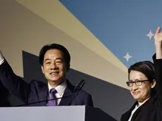 epa11073384 Taiwanese Vice President and ruling Democratic Progressive Party (DPP) presidential candidate William Lai Ching-te (C) and vice presidential candidate Hsiao Bi-khim wave after winning the presidential elections, during a press conference in Taipei, Taiwan, 13 January 2024. DPP's William Lai is set to be Taiwan's next president after his rivals conceded defeat in the Taiwan presidential elections. EPA/DANIEL CENG