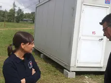 Debora Serracchiani (Presidente Regione Friuli Venezia Giulia) accanto ai moduli donati dalla Danieli S.p.A. di Buttrio agli agricoltori colpiti dal terremoto del 24 agosto - Amatrice (Rieti) 19/09/2016