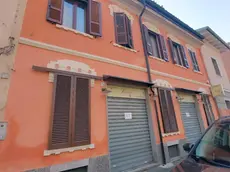 Una veduta esterna della pizzeria Le Vignole con il cartello che chiede di non mettere fiori, di proprietà di Giovanna Pedretti, trovata morta, Sant'Angelo Lodigiano, 15 gennaio 2024. ANSA/ FLAVIA MAZZA