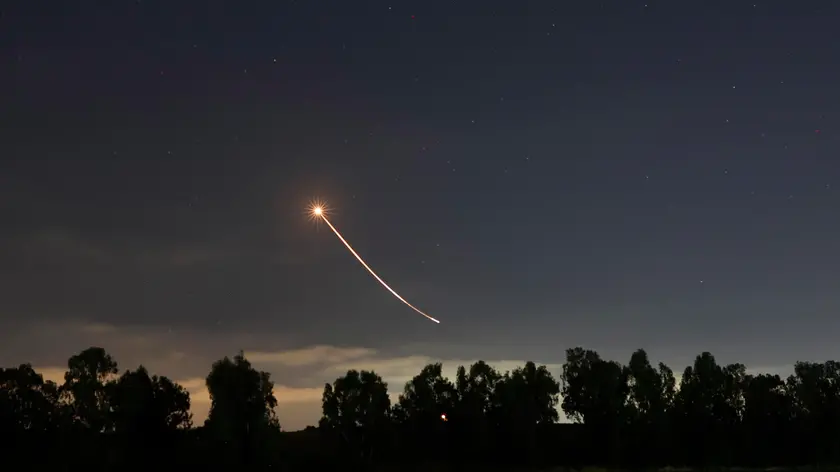epa09198098 The trail of a rocket fired by the Israeli 'Iron Dome' anti-rocket defense system is seen in the air as it intercepts rockets fired from Gaza Strip, near the city of Sderot, Israel, 13 May 2021. Clashes erupted over the forced eviction of six Palestinian families from their homes in Sheikh Jarrah neighborhood in favor of Jewish families who claimed they used to live in the houses before fleeing in the 1948 war that led to the creation of Israel. In response to days of violent confrontations between Israeli security forces and Palestinians in Jerusalem, various Palestinian militants factions in Gaza launched rocket attacks since 10 May that killed at least six Israelis to date. The Gaza Strip's health ministry said that at least 65 Palestinians, including 13 children, were killed in the recent retaliatory Israeli airstrikes. Hamas confirmed the death of Bassem Issa, its Gaza City commander, during an airstrike. EPA/ATEF SAFADI