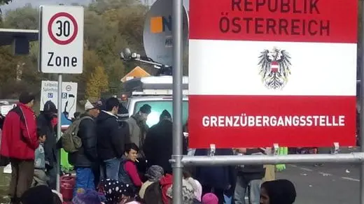 epa04991030 Refugees at the Slovenian-Austrian border in Spielfeld, Austria, 23 October 2015. Thousands of refugees kept streaming into Slovenia 22 October 2015, straining the small country's resources and its patience with other EU nations that have been passing on migrants who want to reach Western Europe. Slovenia has become the latest country to come under pressure from Europe's migration crisis. More than 680,000 migrants and refugees have arrived on the continent by sea this year, the biggest population movement it has experienced since World War II. EPA/AKOS TERBA HUNGARY OUT
