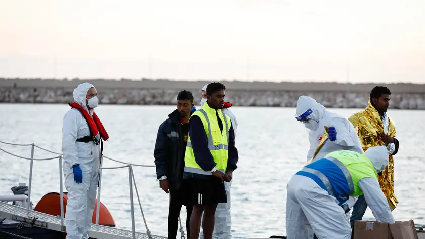 The 17 migrants who survived the shipwreck of 12 March 2023 off the Libyan coast are welcomed in the port of Pozzallo, Sicily, Italy, 13 March 2023. The survivors, all originally from Bangledesh, were transhipped on Coast Guard patrol boats by the merchant ship "Froland", which had rescued them. ANSA/FRANCESCA RUTA