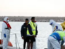 The 17 migrants who survived the shipwreck of 12 March 2023 off the Libyan coast are welcomed in the port of Pozzallo, Sicily, Italy, 13 March 2023. The survivors, all originally from Bangledesh, were transhipped on Coast Guard patrol boats by the merchant ship "Froland", which had rescued them. ANSA/FRANCESCA RUTA