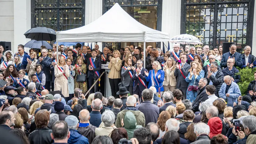 epa11427504 National and local representatives speak out during a rally against anti-Semitism in front of the town hall of Courbevoie, a suburb of Paris, France, 21 June 2024. Hundreds of demonstrators gathered outside the town hall of the northern Paris suburb for a rally organized by the parties elected at the city hall following the alleged rape of a 12-year-old Jewish girl on 15 June. EPA/CHRISTOPHE PETIT TESSON