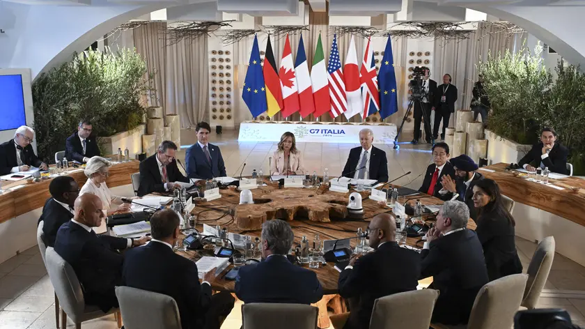 (L_R) Justin Trudeau Prime Minister of Canada, Giorgia Meloni Prime Minister of Italy, Joe Biden President of the United States and Fumio Kishida Prime Minister of Japan attend, during the G7 summit in Borgo Egnazia, Brindisi, Italy, at the table dedicated to the partnership for global infrastructure and investment , 13 june 2024 ANSA / CIRO FUSCO