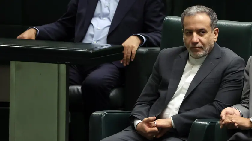 epa11552440 Iranian nominee for Foreign Ministry, former nuclear negotiator Abbas Araghchi, attends a Parliament session for the presentation of Iranian President Masoud Pezeshkin's cabinet picks, at the Iranian Parliament in Tehran, Iran, 17 August 2024. EPA/ABEDIN TAHERKENAREH