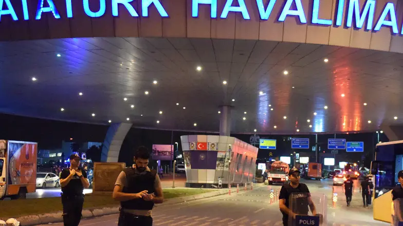 (160629) -- ISTANBUL, June 29, 2016 (Xinhua) -- Policemen stand guard at the entrance to Ataturk International Airport in Istanbul, Turkey, June 29, 2016. Turkish Prime Minister Binali Yildirim on Wednesday blamed the Islamic State for the bombing attacks that killed 36 people at the airport Tuesday night. (Xinhua/He Canling)