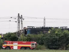 epa11442040 The scene in the aftermath of a train crash in the city of Nove Zamky, Slovakia, 27 June 2024. The accident happened at a railway crossing near the town of Nove Zamky in Southern Slovakia. Five ambulances and two helicopters have been despatched to the accident site. An express train carrying more than 100 passengers from Budapest to Prague crashed into a bus shortly after 5 p.m. local time, killing at least five people and injuring several others. EPA/JAKUB GAVLAK