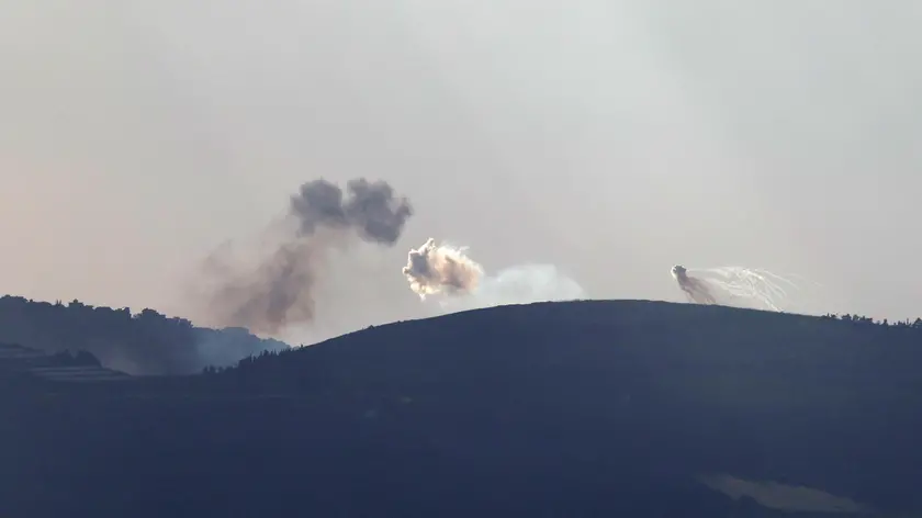 epa11619263 Smoke rises as a result of an Israeli airstrike on the south Lebanon village of Markaba, as seen form the Upper Galilee, northern Israel, 22 September 2024. The Israeli military said that about 85 projectiles were identified crossing from Lebanon into several areas in northern Israel on 22 September. Some of the shells were intercepted, and fallen projectiles were located in Kiryat Bialik, Tsur Shalom and Moreshet, igniting fires in the area, the statement added. There are no casualties in the incident. Following the attack on northern Israel the Israel Defense Forces (IDF) said it conducted strikes against Hezbollah targets in Lebanon. EPA/ATEF SAFADI