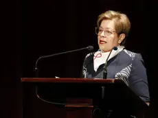 epa10326085 Colombian Minister of Labor Gloria Ines Ramirez speaks during the commemoration of the six years since the signing of the Peace Agreement between the Colombian Government and the FARC guerrillas, at the Teatro Colon in Bogota, Colombia, 24 November 2022. Colombia celebrated the six years since the Peace Agreement between the Government and the FARC guerrillas was signed with a cultural event. EPA/CARLOS ORTEGA