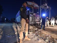 epa10969519 A Pakistani police official stands guard during a late night search operation after the Pakistani government's deadline to expel undocumented immigrants expired in Karachi, Pakistan, 11 November 2023. The deadline set by Pakistan's government for undocumented immigrants and refugees to leave the country voluntarily expired on 01 November 2023. Pakistani authorities started to crack down on irregular migration, which particularly affects millions of Afghan refugees who had fled their homeland, many of them driven by decades of armed conflict and the return to power of the Taliban. Since Pakistan announced the deadline, a huge migratory flow has been recorded on the porous border between Pakistan and Afghanistan. According to official data, about 4.4 million Afghans are living in the country, of which 1.7 million are not registered. EPA/SHAHZAIB AKBER