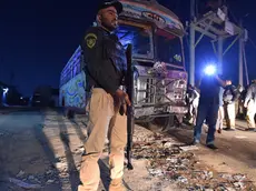 epa10969519 A Pakistani police official stands guard during a late night search operation after the Pakistani government's deadline to expel undocumented immigrants expired in Karachi, Pakistan, 11 November 2023. The deadline set by Pakistan's government for undocumented immigrants and refugees to leave the country voluntarily expired on 01 November 2023. Pakistani authorities started to crack down on irregular migration, which particularly affects millions of Afghan refugees who had fled their homeland, many of them driven by decades of armed conflict and the return to power of the Taliban. Since Pakistan announced the deadline, a huge migratory flow has been recorded on the porous border between Pakistan and Afghanistan. According to official data, about 4.4 million Afghans are living in the country, of which 1.7 million are not registered. EPA/SHAHZAIB AKBER