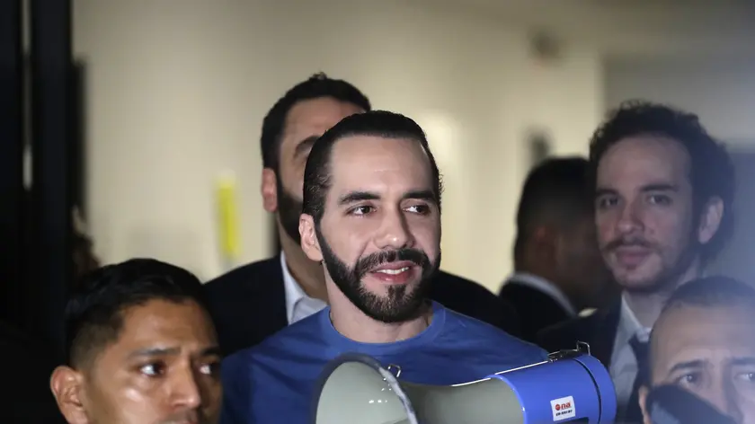 epa10942071 El Salvador President Nayib Bukele (C) leaves the Supreme Electoral Tribunal (TSE) after registering as a candidate for the presidency for the period 2024-2029, in San Salvador, El Salvador, 26 October 2023 (issued 27 October 2023). The general elections in El Salvador will be held on 04 February 2024. EPA/Rodrigo Sura