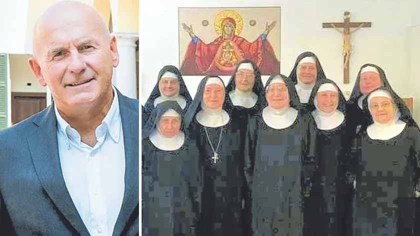 Le monache di Poffabro e, al centro, Massimo Folador, per anni manager e oggi attento conoscitore della storia e della cultura del movimento benedettino