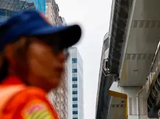epa11256679 A police officer stands guard near a damaged overhead railway bridge following a magnitude 7.4 earthquake near Hualien, in New Taipei, Taiwan, 03 April 2024. A magnitude 7.4 earthquake struck Taiwan on the morning of 03 April with an epicenter 18 kilometers south of Hualien City at a depth of 34.8 km, according to the United States Geological Survey (USGS). EPA/DANIEL CENG