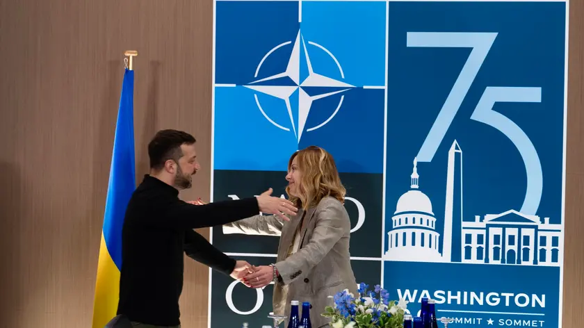epa11473728 A handout photo made available by Chigi Palace Press Office shows Italian Prime Minister Giorgia Meloni (R) greets Ukrainian President Volodymyr Zelensky (L) during their meeting at the end of the working sessions during the North Atlantic Treaty Organization (NATO) Summit in Washington, DC, USA, 11 July 2024 (issued 12 July 2024). The 75th Anniversary NATO Summit takes place in Washington, DC, from 09 to 11 July 2024. EPA/FILIPPO ATTILI / CHIGI PALACE PRESS OFFICE / HANDOUT HANDOUT EDITORIAL USE ONLY/NO SALES