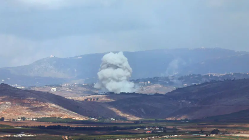 epa11620317 Smoke rises after an Israeli airstrike that targeted a Lebanese village, as seen from the Upper Galilee, northern Israel, 23 September 2024. The Israeli military said that The IDF is currently conducting strikes on targets belonging to the Hezbollah organization in southern Lebanon and urged civilians in areas where Hezbollah operates in Lebanon to leave, saying that they are conducting 'extensive airstrikes.' EPA/ATEF SAFADI