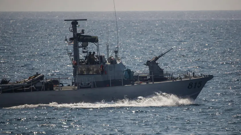 epa09999193 An Israeli navy vessel guards at the Mediterranean sea next to Rosh Hanikra, near Haifa at the Israel-Lebanon border, 06 June 2022. Lebanese President Michel Aoun stressed that 'any Israeli exploration, excavation or extraction activities carried out in the disputed areas constitute an act of aggression' after natural gas storage and production ship Energean entered into the disputed area in the southern maritime borders. Aoun also asked the Lebanese army leadership to provide him with accurate and official data in this regard. EPA/ATEF SAFADI