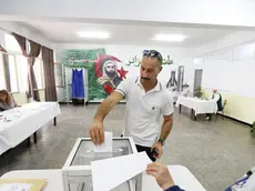 epa11590801 A voter casts his ballot at a polling station during a presidential election in Algiers, Algeria, 07 September 2024. According to the National Independent Authority for Elections (ANIE), more than 24 million Algerians are called to the polls to elect a new president of the republic for a five-year term. Three candidates are in the running for this election; the national secretary of the Socialist Forces Front (FFS), Youcef Aouchiche, the president of the Movement of Society for Peace (MSP), Abdelaali Hassani Cherif, and the current president, Abdelmadjid Tebboune. EPA/MOHAMED MESSARA