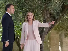 epa11407581 Italy's Prime Minister Giorgia Meloni (R) greets French President Emmanuel Macron (L) during a welcome ceremony for the G7 summit in Borgo Egnazia, southern Italy, 13 June 2024. The 50th G7 summit will bring together the Group of Seven member states leaders in Borgo Egnazia resort in southern Italy from 13 to 15 June 2024. EPA/ETTORE FERRARI