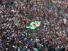 epa11528468 Bangladeshi people gather in Dhaka, Bangladesh, 05 August 2024. In an address to the nation, Chief of Army Staff General Waker-Uz-Zaman announced that Prime Minister Sheikh Hasina has resigned after weeks of unrest and an interim government will be formed to run the country. Dhaka authorities have imposed a new curfew starting 06:00 p.m. local time on 04 August. As casualties mounted and law enforcement struggled to contain the unrest, the Bangladeshi government on 20 July 2024 had imposed an initial nationwide curfew and deployed military forces after violence broke out in Dhaka and other regions following student-led protests demanding reforms to the government's job quota system. EPA/MONIRUL ALAM