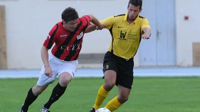 Fagagna 25 Agosto 2013. Coppa Italia Dilettanti. Fagagna (maglia rosso nera) - Flaibano (maglia gialla). Numero 7 Fagagna. Telefoto Copyright Petrussi Foto Press / Diego Petrussi