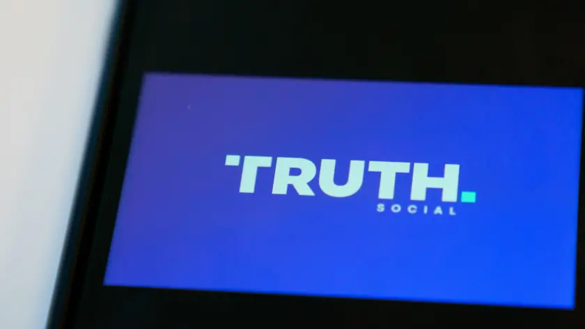 epa11266115 The Truth Social app seen on a mobile phone in Washington, DC, USA, 08 April 2024. Trump Media and Technology Group, which owns Truth Social, saw its stocks fall by 10 percent on 08 April after peaking the day after the company went public on 26 March 2024. EPA/WILL OLIVER