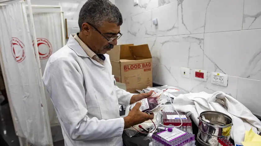 epa11403775 Blood donations are handled inside Nasser Hospital at Khan Yunis camp, due to a shortage of blood units for patients in hospitals, southern Gaza Strip, 11 June 2024. More than 37,000 Palestinians and over 1,400 Israelis have been killed, according to the Palestinian Health Ministry and the Israel Defense Forces (IDF), since Hamas militants launched an attack against Israel from the Gaza Strip on 07 October 2023, and the Israeli operations in Gaza and the West Bank which followed it. EPA/HAITHAM IMAD