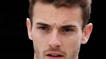 (FILE) French Formula One driver Jules Bianchi of Marussia F1 Team walks in paddock during the first practice session at the Monte Carlo circuit in Monaco, 22 May 2014. ANSA/VALDRIN XHEMAJ