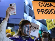 epa09583873 People attend a march in support of the demonstrations held today, 15N, in Cuba to demand democratic changes on the island and the release of political prisoners, at Puerta del Sol square in Madrid, Spain, 15 November 2021. EPA/KIKO HUESCA