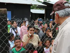 epa11443806 Elected president of Panama, Jose Raul Mulino (R), visits the Lajas Blancas migrant shelter in Darien, Panama, 28 June 2024. Mulino said that he aspires to sign with the United States, within the framework of his assumption of office on 01 July 2024, an agreement for the repatriation of irregular migrants who arrive in the Central American country through the dangerous Darien jungle, the natural border with Colombia. EPA/Moncho Torres