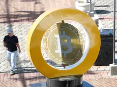 epa11474675 The bitcoin symbol in Plaza San Bartolome in Ilopango, El Salvador, 11 July 2024 (issued 12 July 2024). The adoption of bitcoin as legal tender in El Salvador, a project promoted and promoted by the Government of President Bukele to promote financial inclusion, attract foreign investment and improve the economy, does not convince the majority of the population who refuse to use it on a daily basis almost three years after its validity. EPA/Rodrigo Sura