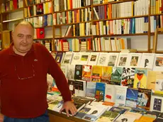 ANTEPRIMA UDINE 25 OTTOBRE 2002 GIOVANNI TAVOSCHI DELLA LIBRERIA TARANTOLA TELEFOTO COPYRIGHT FOTO AGENCY ANTEPRIMA UDINE