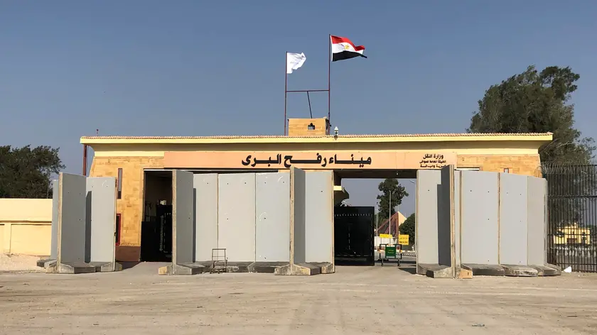 epa10934398 A view of the Rafah border gate with Gaza Strip, in Rafah, Egypt, 23 October 2023. Following negotiations between Egypt, the US, and Israel to allow relief aid to enter the Gaza Strip, some 20 aid trucks carrying food, water, and medicine were allowed into the Gaza Strip through the Rafah land crossing on 21 October. 17 more aid trucks were allowed in on 22 October, but UN agencies said it was far from sufficient and many more were needed to be allowed in. EPA/STR