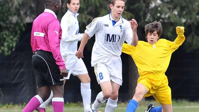 Buttrio, 03 aprile 2013. Calcio - Dilettanti. Selezione Udine (in bianco) vs Selezione Cervignano (in giallo). Copyright Foto Petrussi / Ferraro Simone